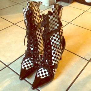 Checkered black and white designed boots